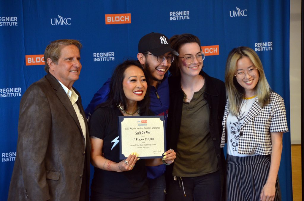 Jackie Nguyen, founder and owner of Cafe Cà Phê, and her team accept first-place honors in the James and Rae Block Kansas City Startup Awards at the Regnier Venture Creation Challenge