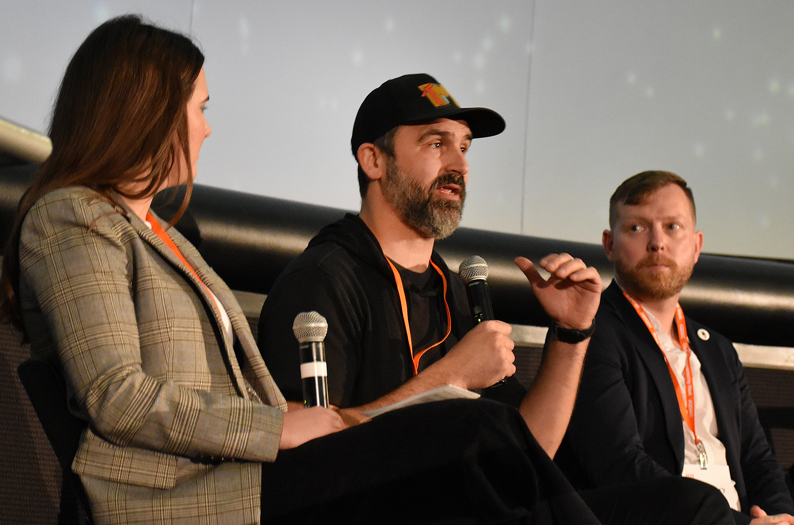 Bo Nelson, owner of Thou Mayest Coffee Roasters, speaks alongside Maggie Mannebach, an intellectual property attorney from Husch Blackwell, and Alex Lindsey, founder of West Bottoms Whiskey Co., during a GEWKC panel conversation on legal protections for emerging businesses; photo by Tommy Felts, Startland News