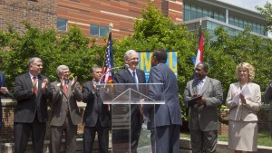 Missouri Gov. Jay Nixon shakes hands with UMKC Chancellor Leo E. Morton. Photo by Janet Rogers/UMKC.