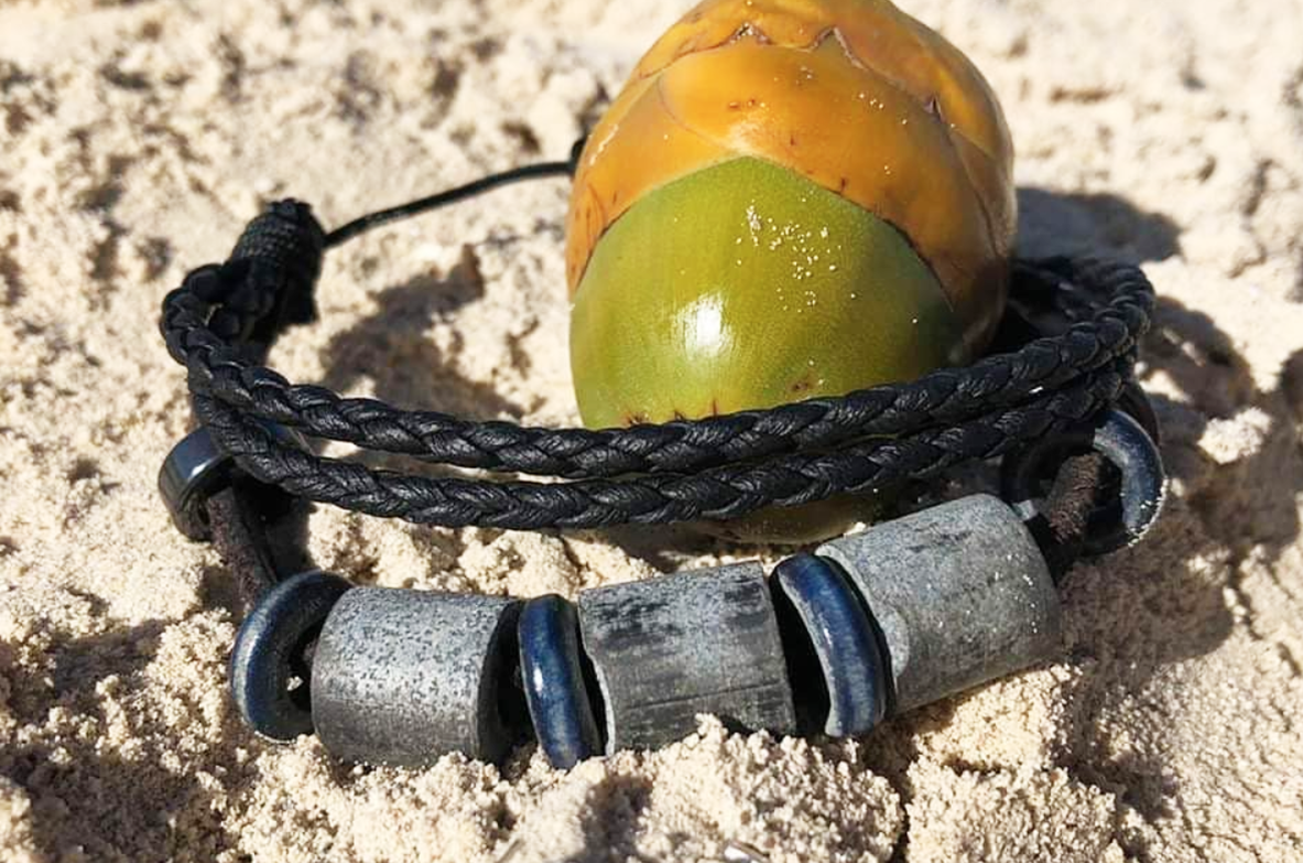 Beach-loving couple hopes to dissolve fear of sharks with Shark OFF repellent bracelets