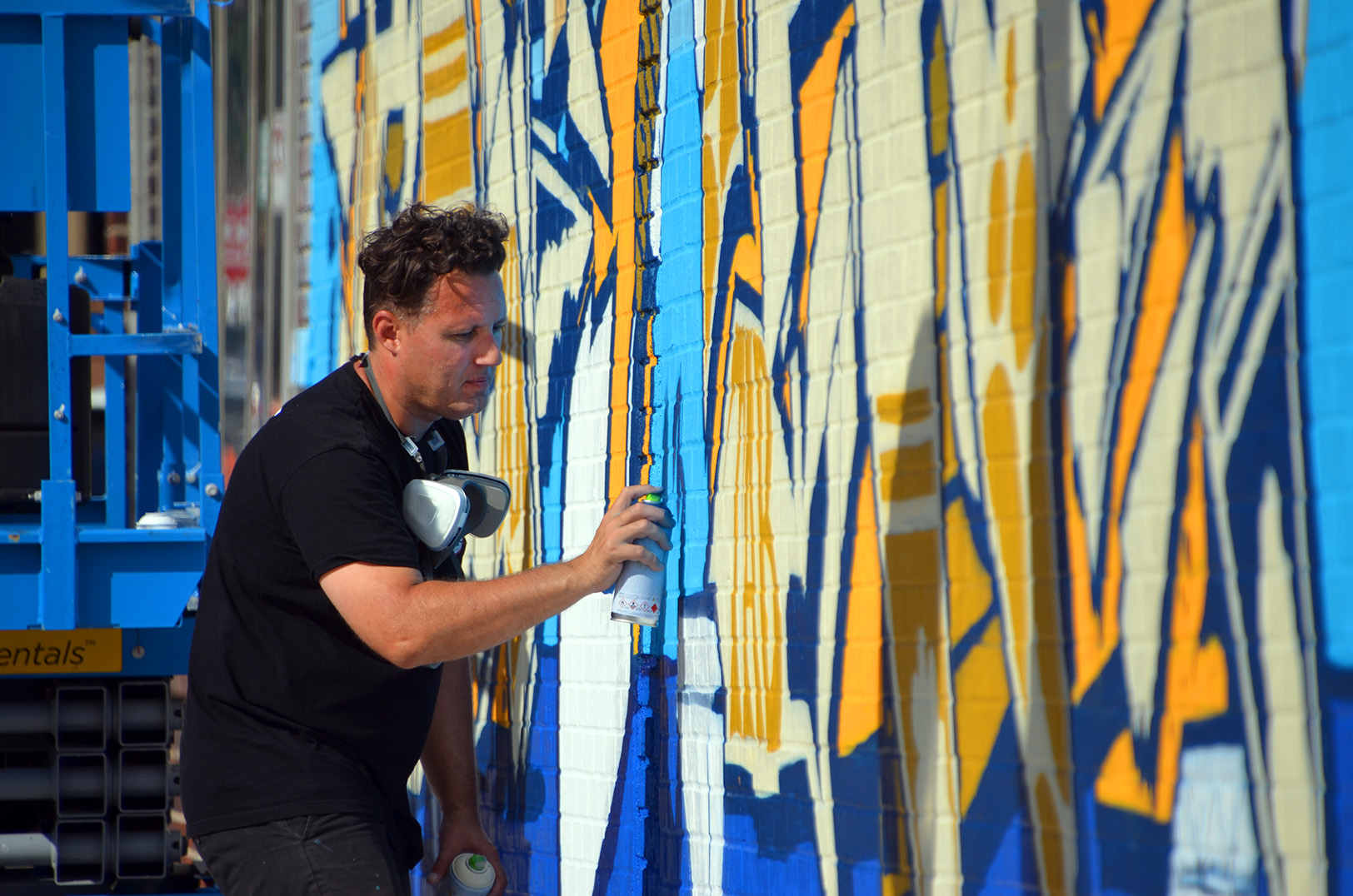 SpraySeeMo returns to Crossroads, painting a shared space for graffiti artists, businesses (Photos)