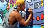 Doodle Dood paints between lines of business and art with Iron District mural, apparel