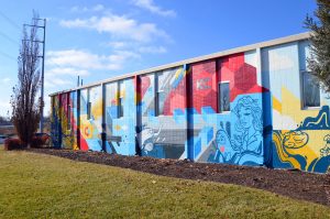 Mural by Phil “Sike Style” Shafer and JT Daniels, Plexpod Lenexa