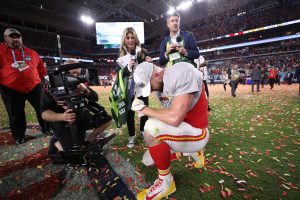 Travis Kelce takes a knee after the Chiefs win the Super Bowl in 2020; photo courtesy of Travis Kelce