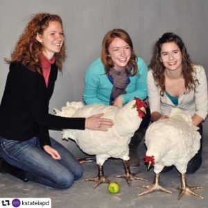 Sally Linville, center, with her first pair of chicken footstools at Kansas State University