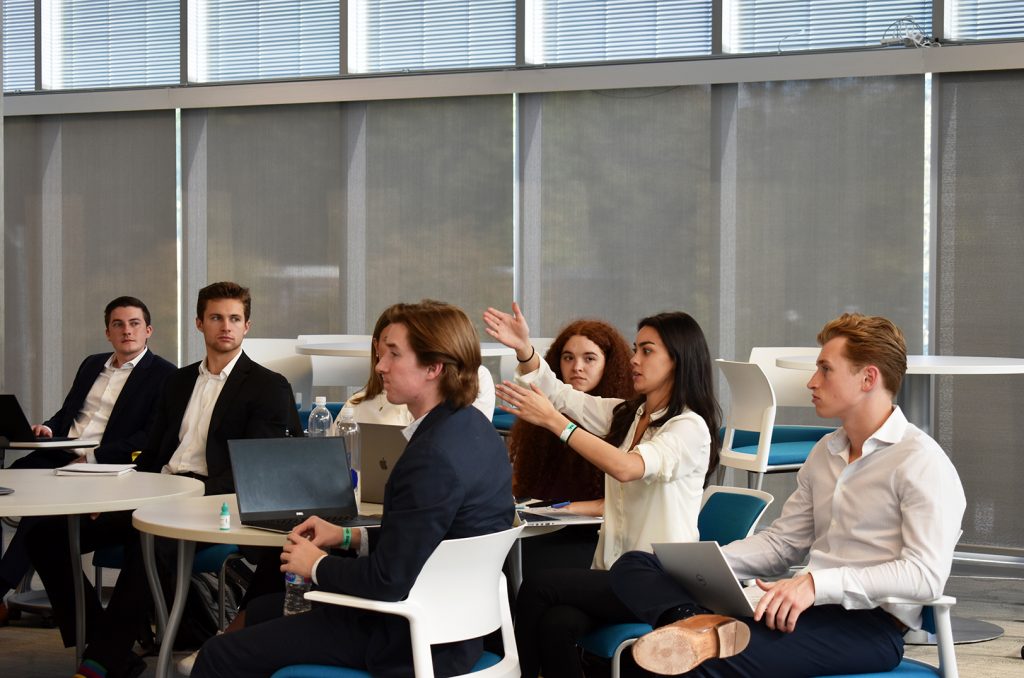 AACE Venture Fund students interacting with Shekhar Gupta, MyANIML, on the University of Missouri-Kansas City campus