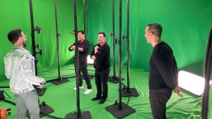 John Saw, T-Mobile’s executive vice president of advanced and emerging technologies, (second from left) and team in a studio surrounded by cameras capturing volumetric images to create holograms displayed on mobile devices. (Courtesy | T-Mobile)