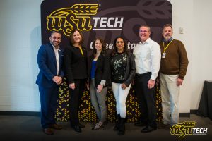 Neelima Parasker, SnapIT Solutions, center, during an announcement event with WSU Tech and Groover Labs in Wichita; photo courtesy of WSU Tech