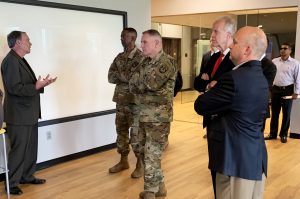 Pete Perna, director of business development at FirePoint, Command Sergeant Major Crosby, General Murray, U.S. Sen. Jerry Moran, and John Tomblin, senior vice president for Industry and Defense Programs at Wichita State University