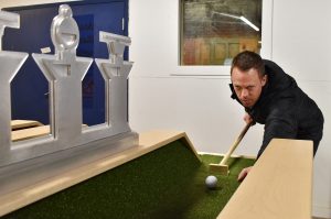 Matt Baysinger demonstrating tabletop golf