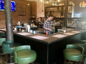 Lula includes a full bar at the west end of the dining room; photo courtesy of CityScene KC