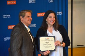 Risa Stein, founder of SeeInMe, accepts the second-place award in the James and Rae Block contest at the Regnier Venture Creation Challenge