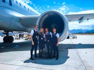 Jaclyn Heupel with American Airlines crew members