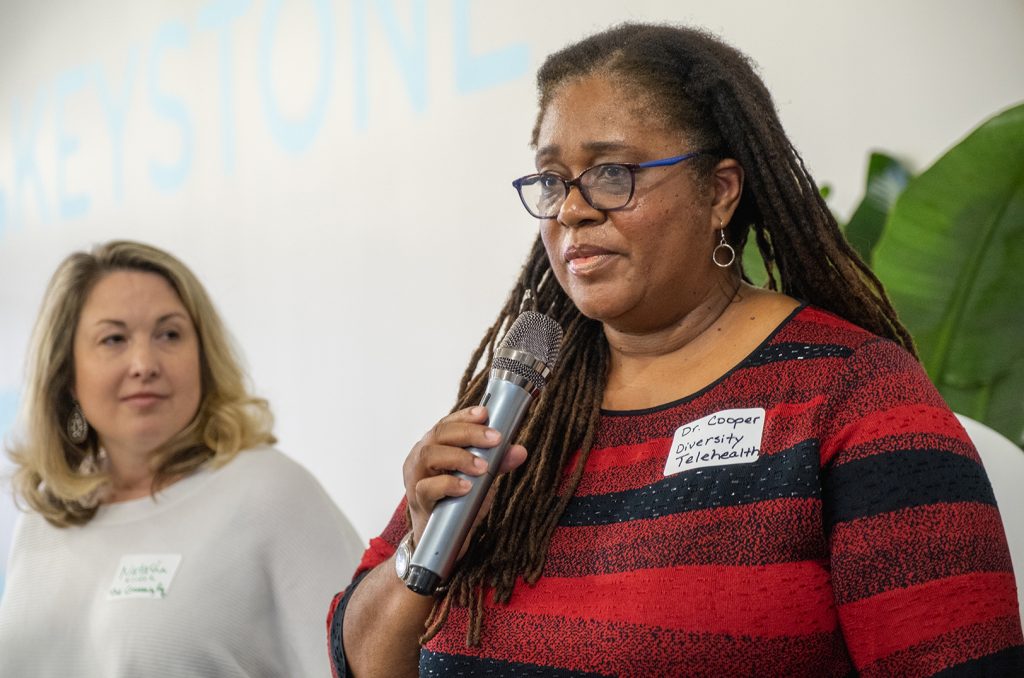 Dr. Shelley Cooper, Diversity Telehealth, right, speaks Tuesday during a cohort announcement for the new LauchKC Social Venture Studio