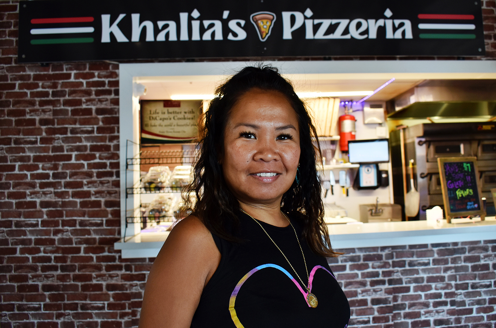 Theresa Santos Khalia’s Pizzeria parlor