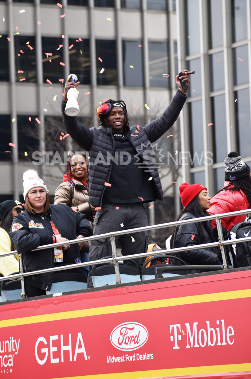 Fan Watches Chiefs' Super Bowl LIV Victory Parade from a Tree