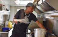 This BBQ vendor comes fully loaded with spuds and spices; Soon he’ll park the business along one of KC’s busiest streets