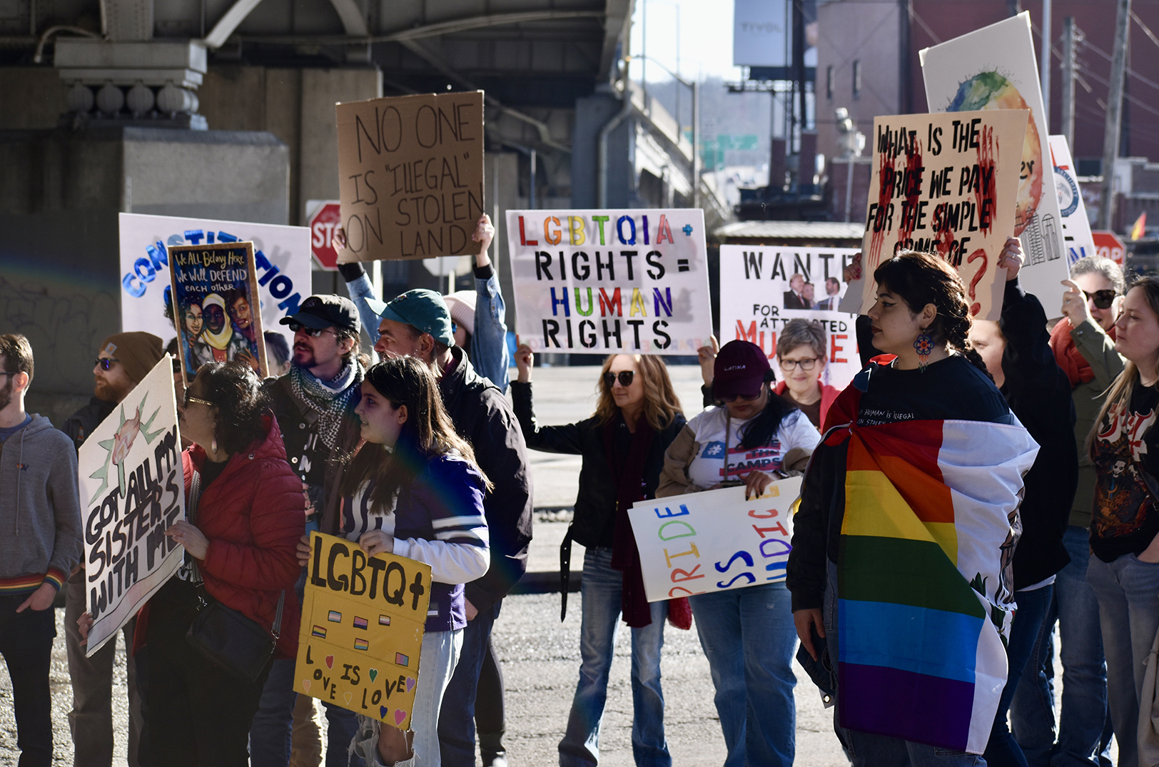 Rally unifies voices amid attacks on immigrants, LGBT+ rights; now it’s time to make noise, organizers say