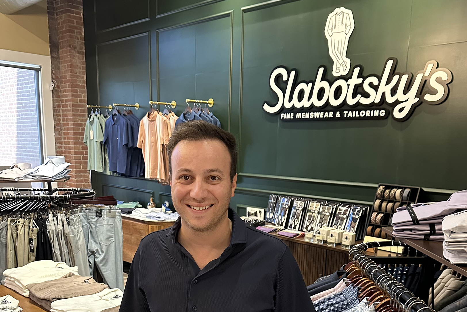 Months after taking over century-old tailor shop, owner putts his new golf apparel brand in play